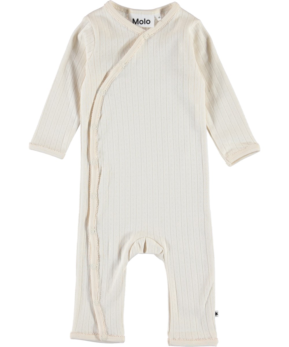 Flora - Pearled Ivory - Økologisk baby dragt i hulmønster