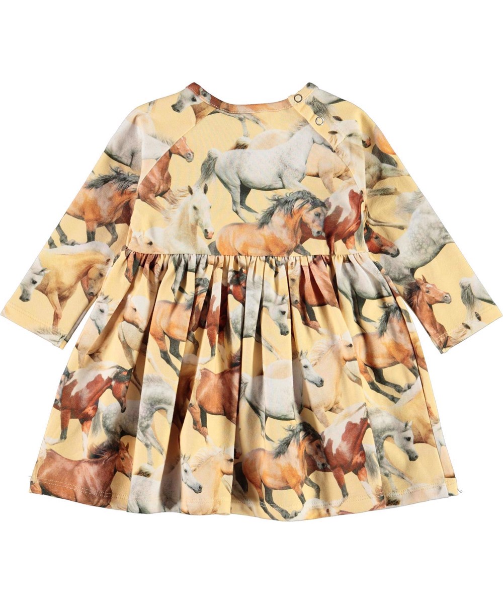 Charmaine - Horse Dreams Baby - Økologisk gul babykjole med heste