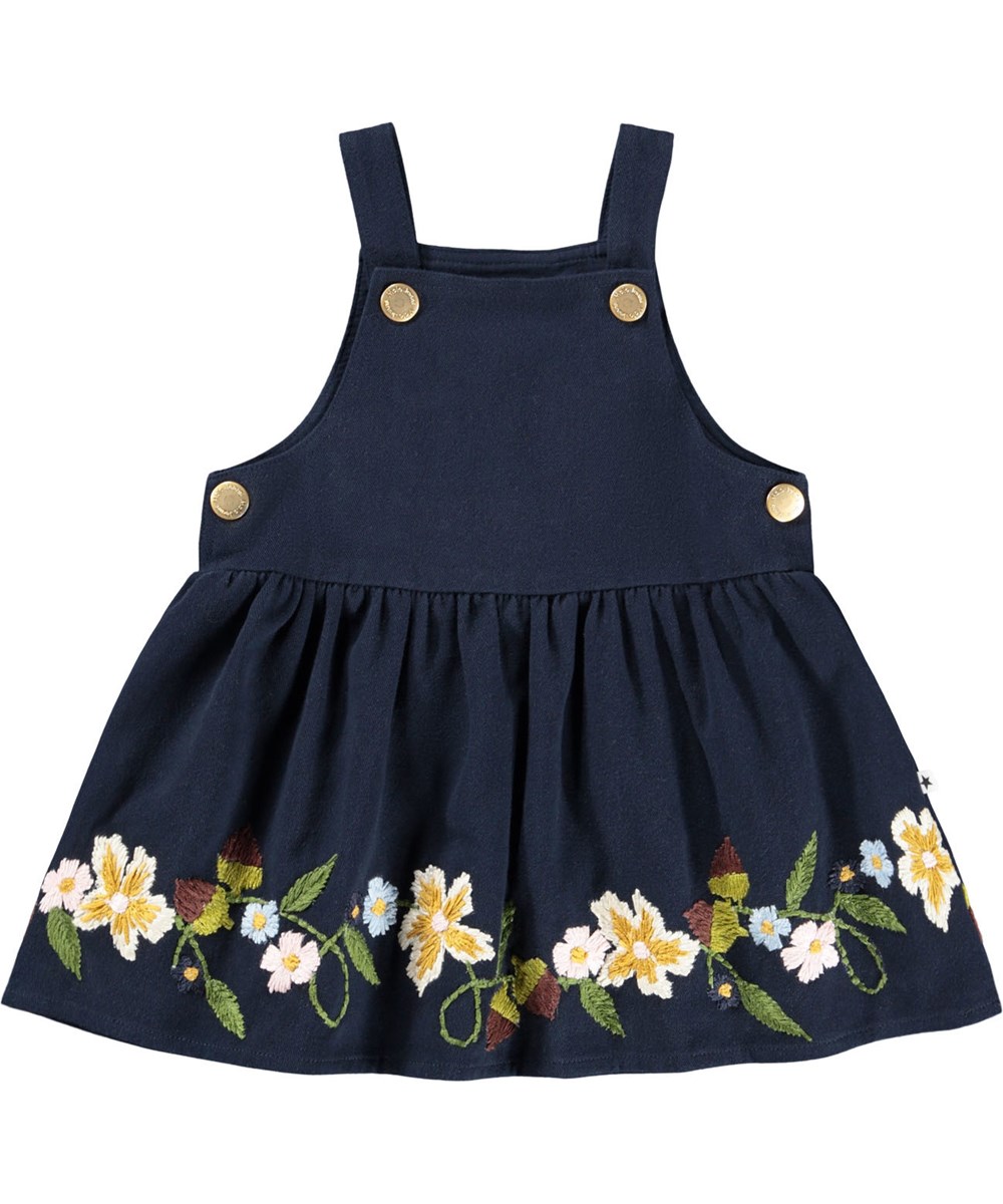 Colleena - Galaxy Blue - Fin mørkeblå smækkjole til baby i bomuld med broderi af blomster og nødder. 