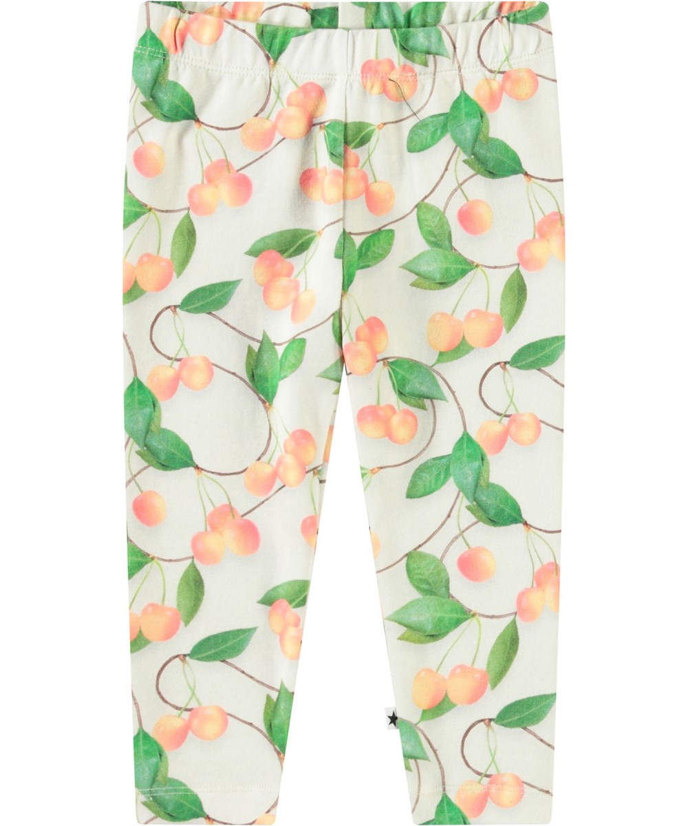 Stefanie - Sweet Cherries - Leggings i økologisk bomuld til baby. Disse leggings er lys beige med print af kirsebær.