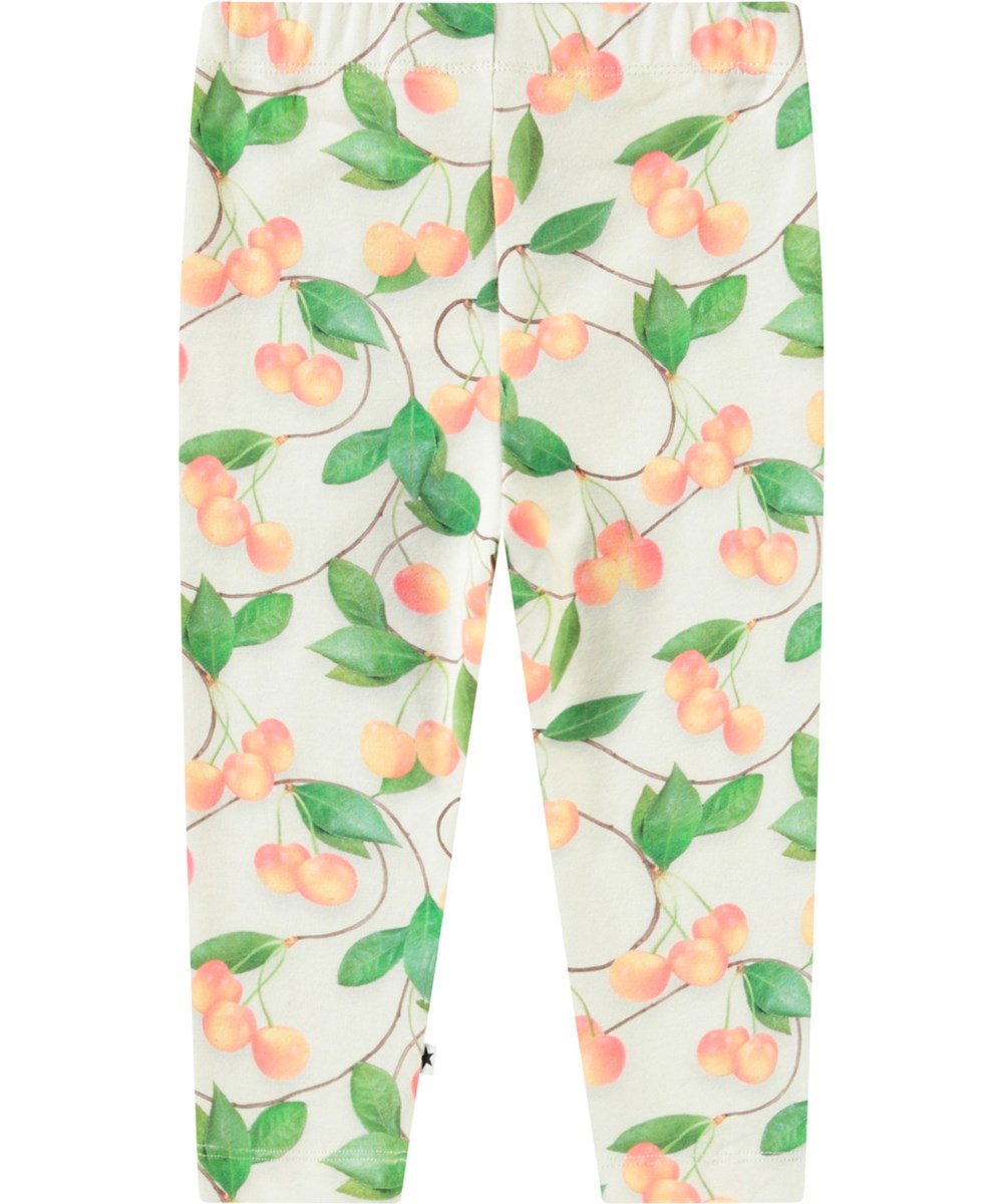 Stefanie - Sweet Cherries - Leggings i økologisk bomuld til baby. Disse leggings er lys beige med print af kirsebær.
