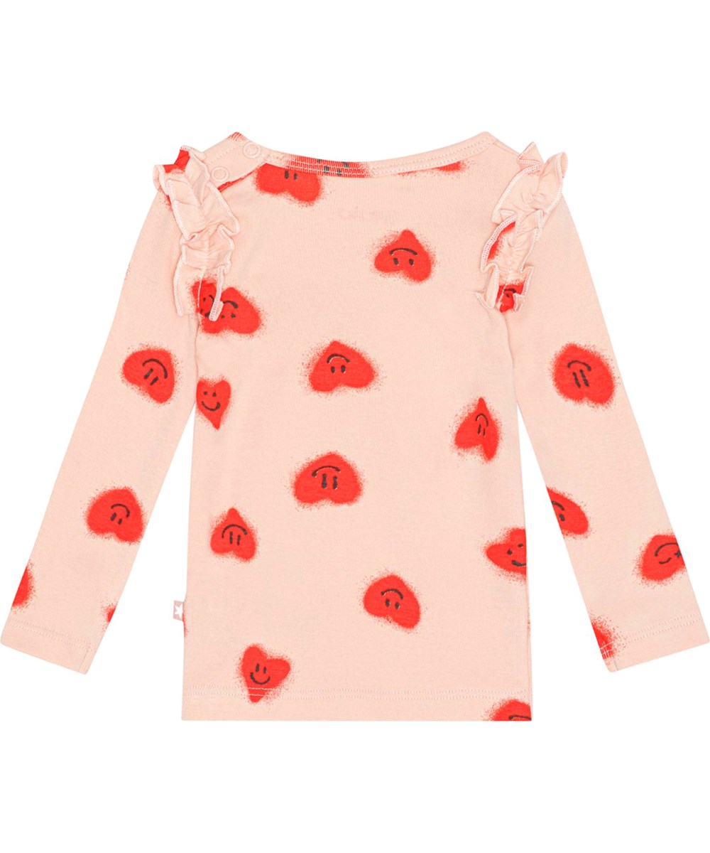 Emma - Red Hearts_ Jersey - Lyserød bluse med lange ærmer i blødt økologisk bomuldsjersey med print af smilende graffiti hjerter