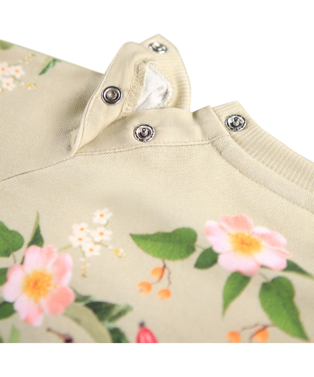 Disc - Forest Bunny - Økologisk lysegrøn babysweatshirt med kanin og blomsterprint. 