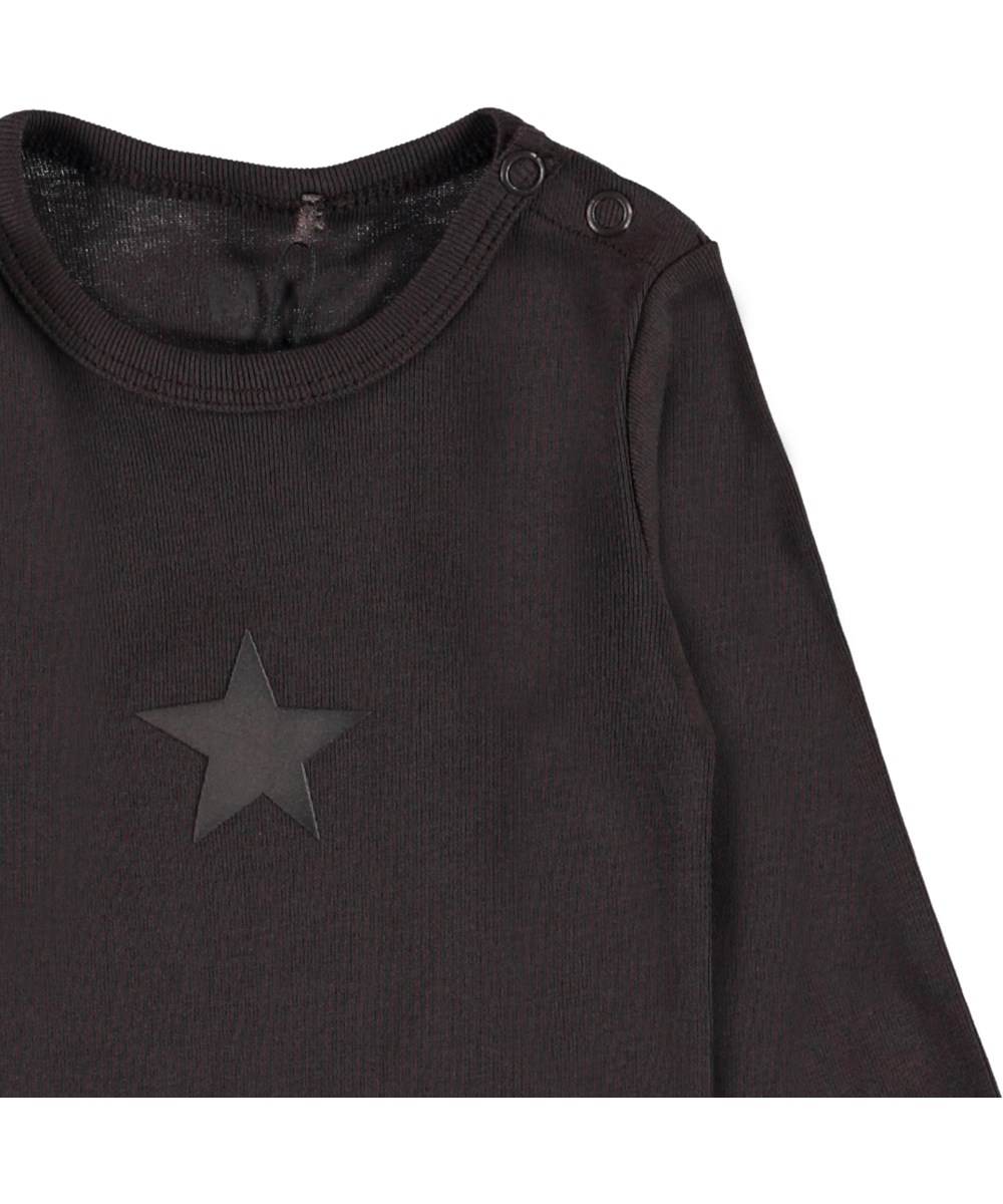 Foss - Brown Darkness - Ekologisk brun body