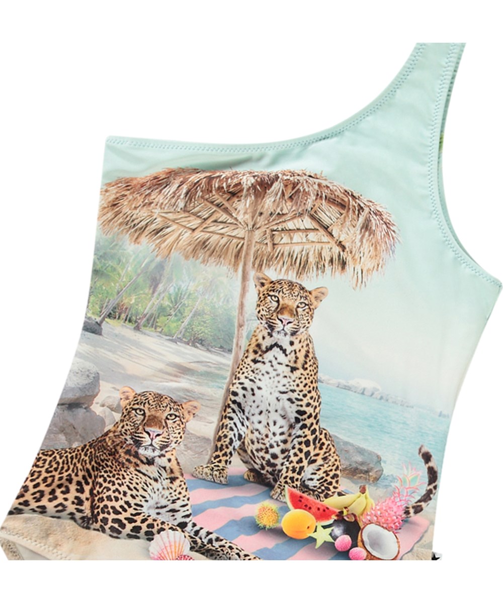 Nai - On The Beach - Hellblauer Einteiler-Badeanzug für aktive Kinder aus recyceltem Polyester mit UV-Schutz 50+.