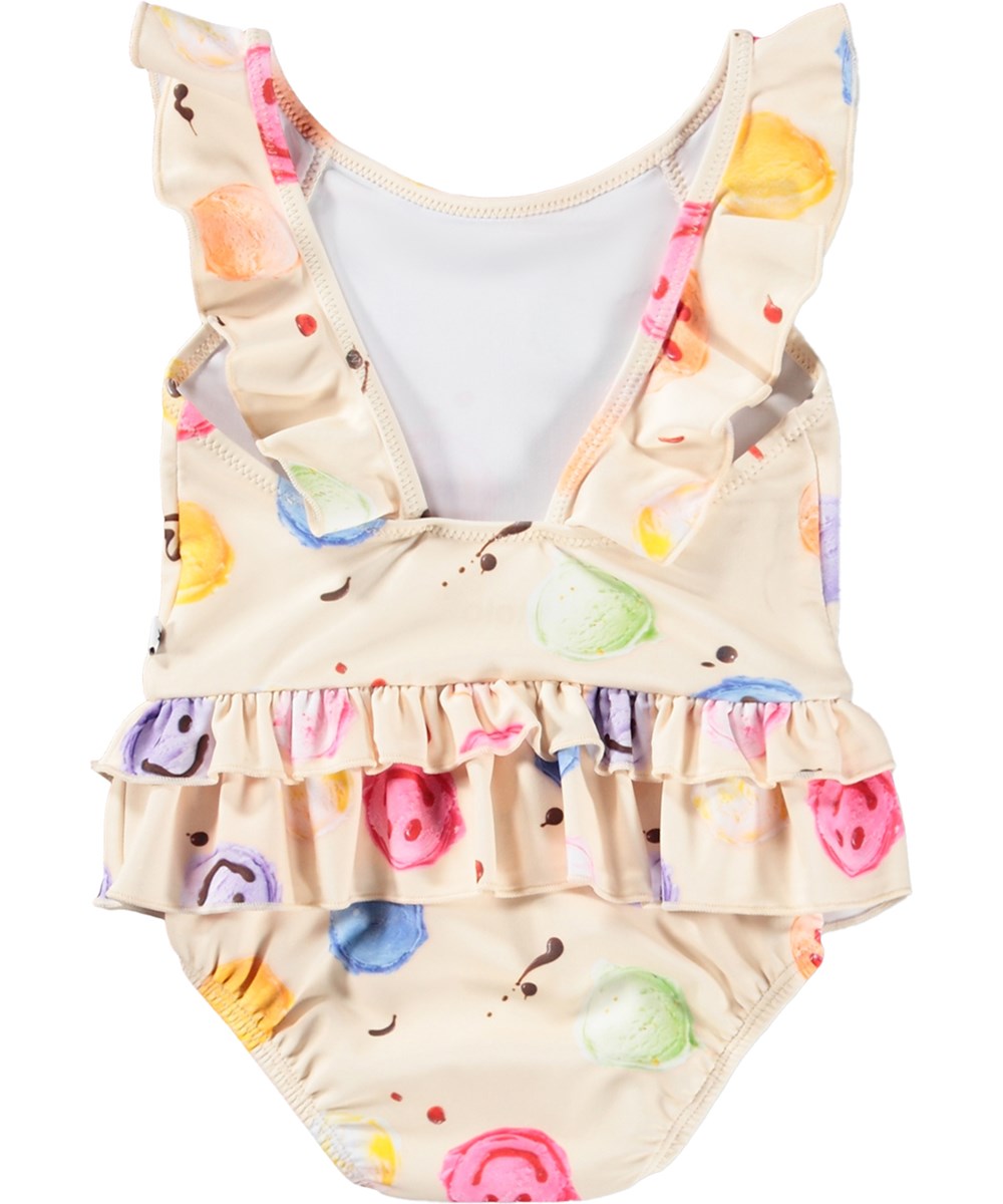 Nalani - Smile Scoops - Cremefarbener Baby-Badeanzug mit Eiscreme-Print aus recyceltem Polyester mit UV-Schutz 50+.