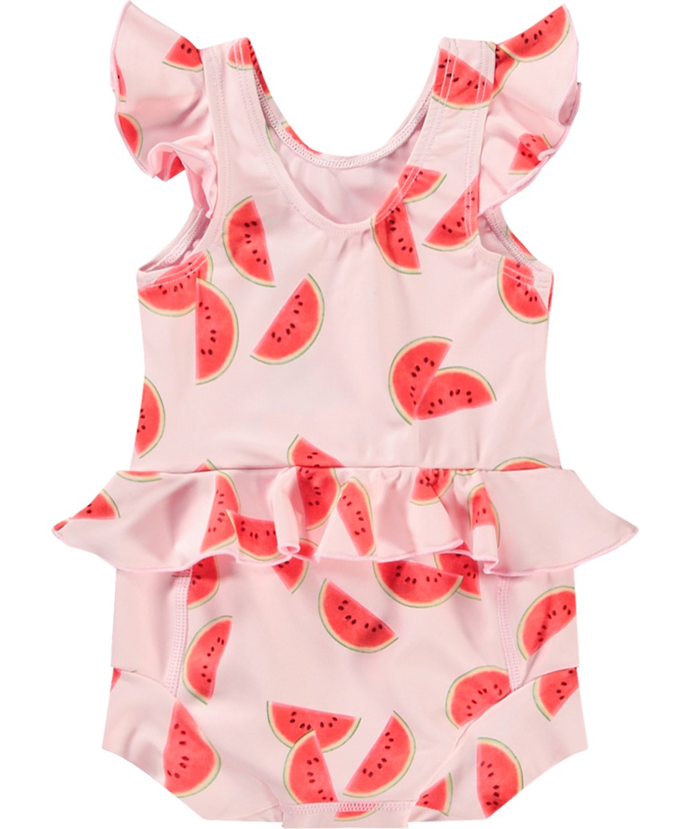 Nandini - Melon Pink - Wasserdichter Baby-Badeanzug aus recyceltem Polyester mit UV-Schutz 50+.