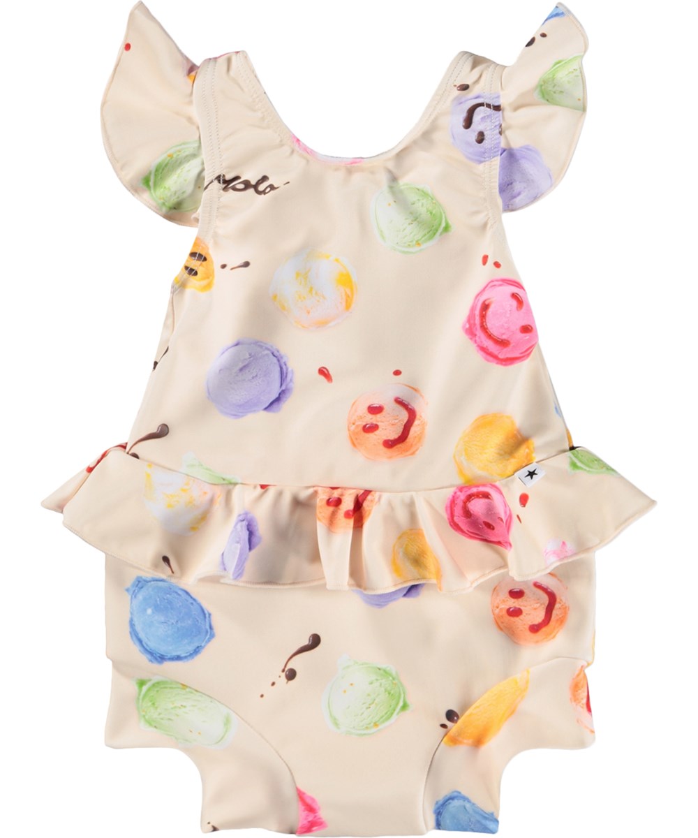 Nandini - Smile Scoops - Cremefarbener, auslaufsicherer Baby-Badeanzug mit Eisprint aus recyceltem Polyester mit UV-Schutz 50+.