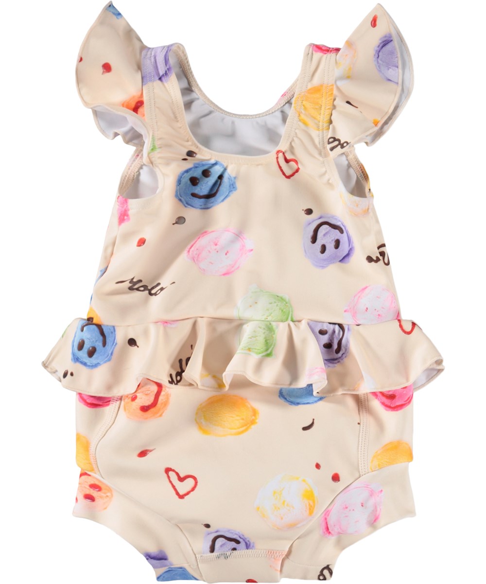 Nandini - Smile Scoops - Cremefarbener, auslaufsicherer Baby-Badeanzug mit Eisprint aus recyceltem Polyester mit UV-Schutz 50+.