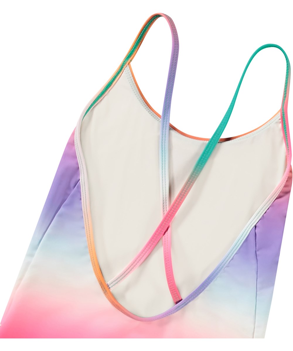 Nanna - Magic Fade - Bunt gestreifter Badeanzug für aktive Kinder aus recyceltem Polyester und UV-Schutz 50+.