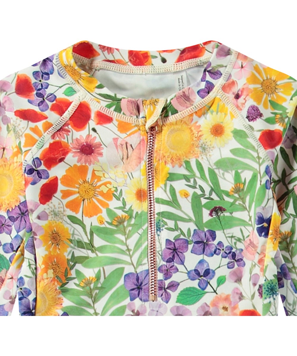 Necky - Flowerpress - Langärmeliger Badeanzug mit Blumenmuster für aktive Kinder aus recyceltem Polyester mit UV-Schutz 50+.