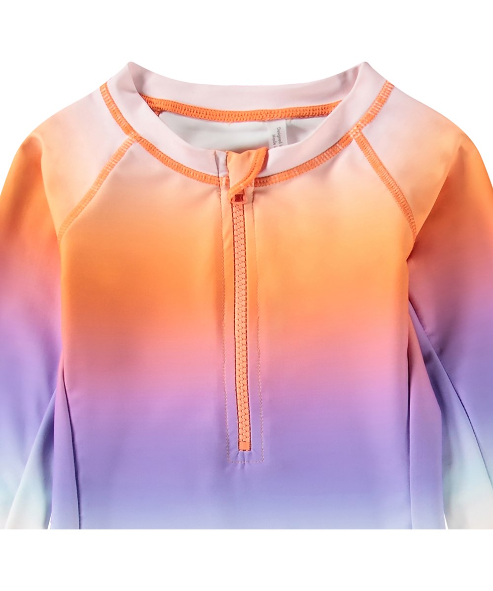 Necky - Magic Fade - Langärmeliger bunter Badeanzug für aktive Kinder aus recyceltem Polyester mit UV-Schutz 50+.