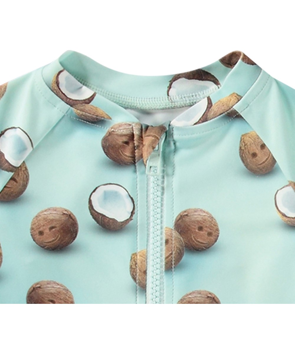 Neka LS - Coquitos - Hellblauer Badeanzug für Kinder mit langen Ärmeln und kurzen Beinen aus recyceltem Polyester und UV-Schutz 50+.