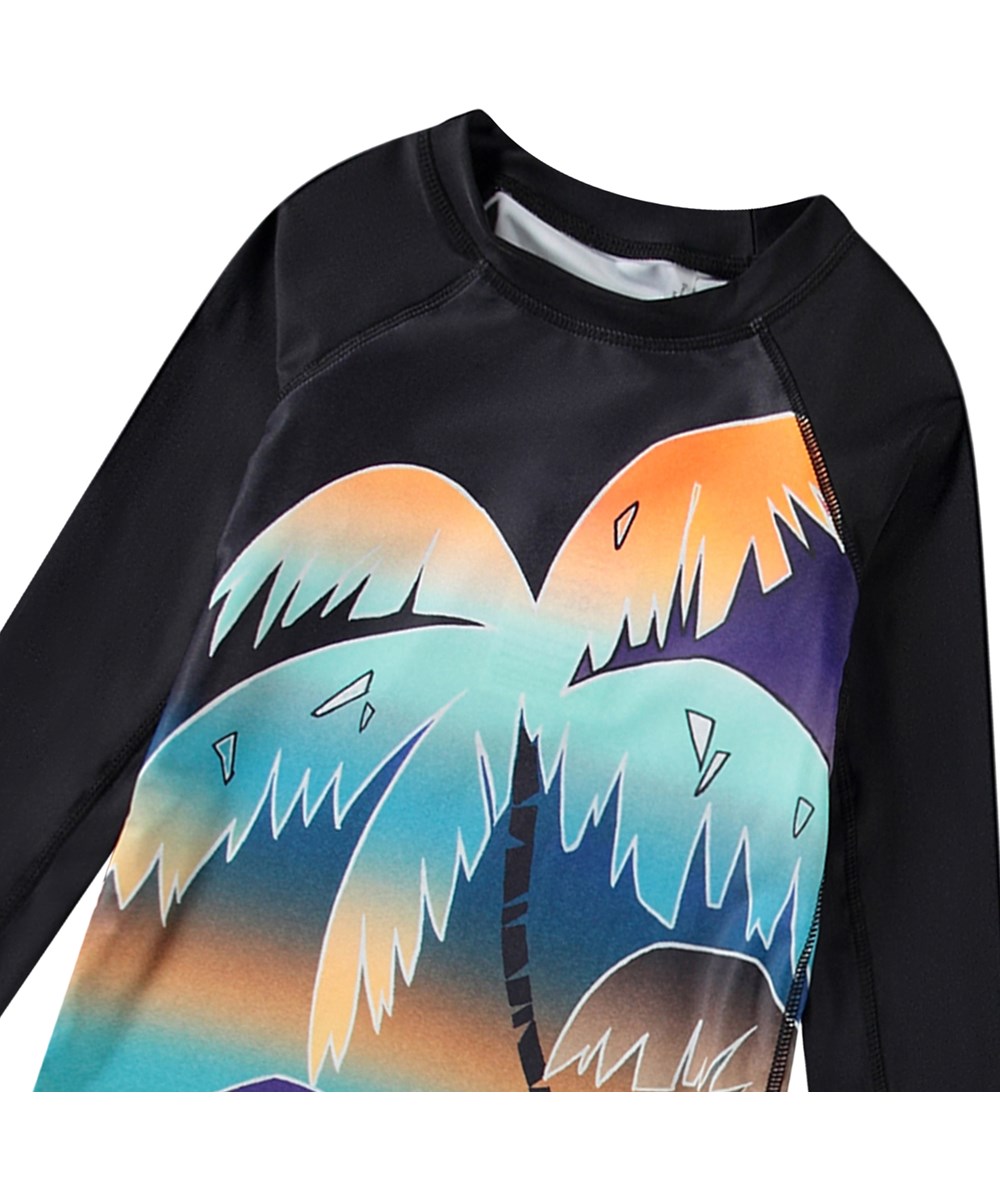 Neptune LS - Faded Palmtrees - Schwarzer Rashguard für aktive Kinder aus recyceltem Polyester mit UV-Schutz 50+.