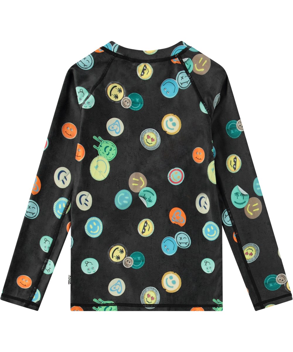Neptune LS - Smile All Over - Schwarzer Rashguard für aktive Kinder aus recyceltem Polyester mit UV-Schutz 50+.