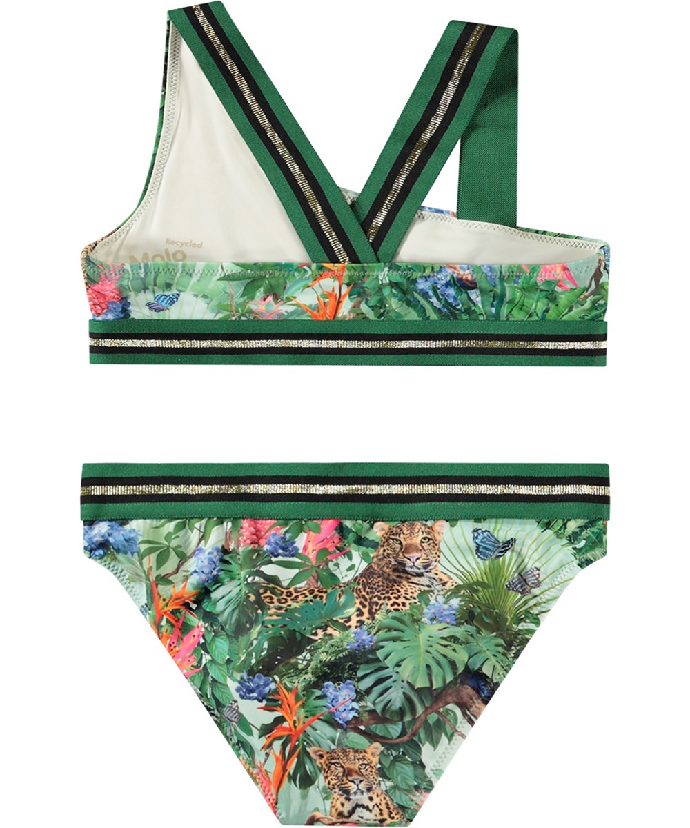 Nicola - Green Tropical - Asymmetrischer sportlicher Bikini für aktive Kinder aus recyceltem Polyester mit UV-Schutz 50+