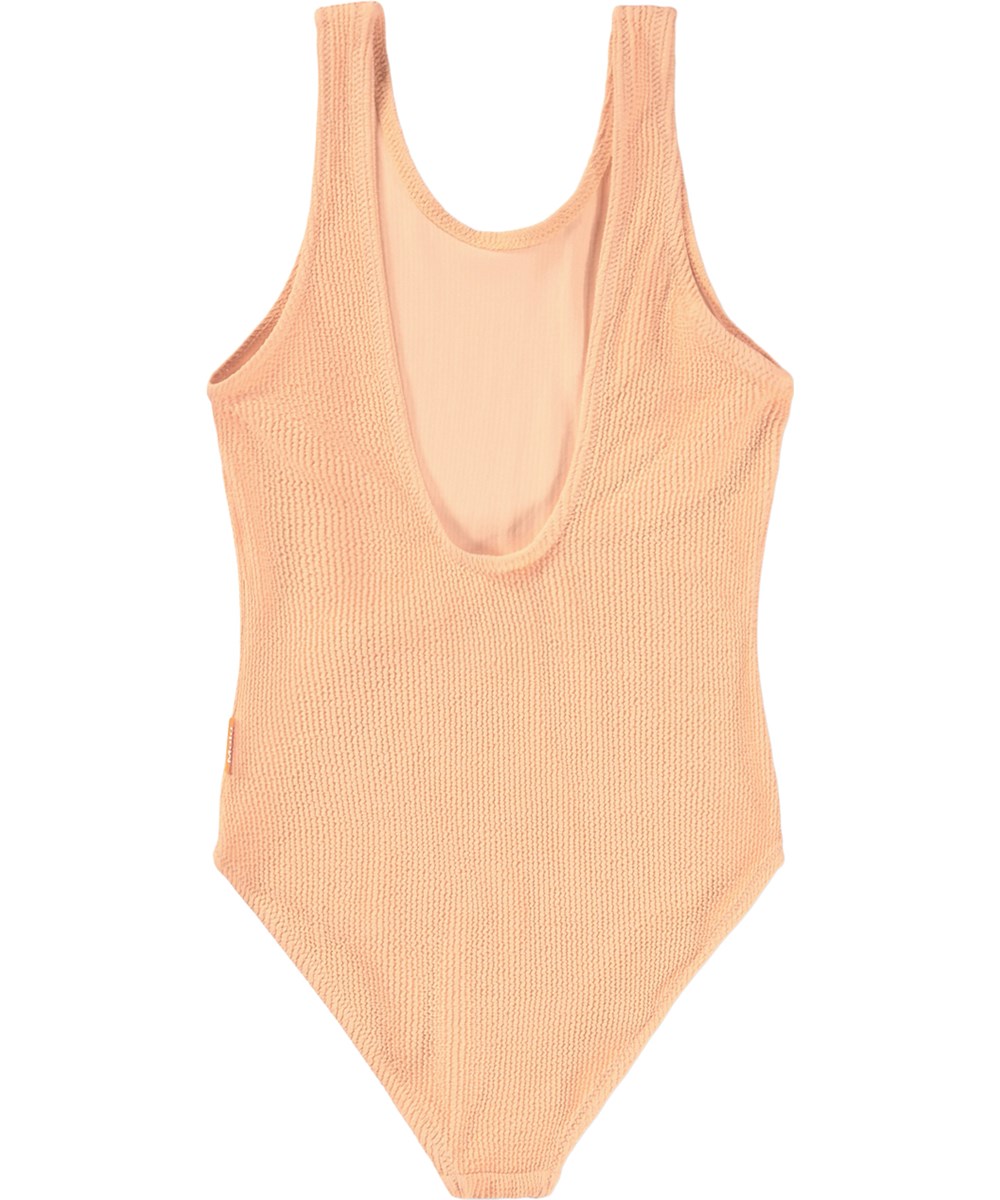 Nika Crepe - Peach Fuzz - Oranger dehnbarer Krepp-Badeanzug für Kinder mit UV-Schutz 50+.