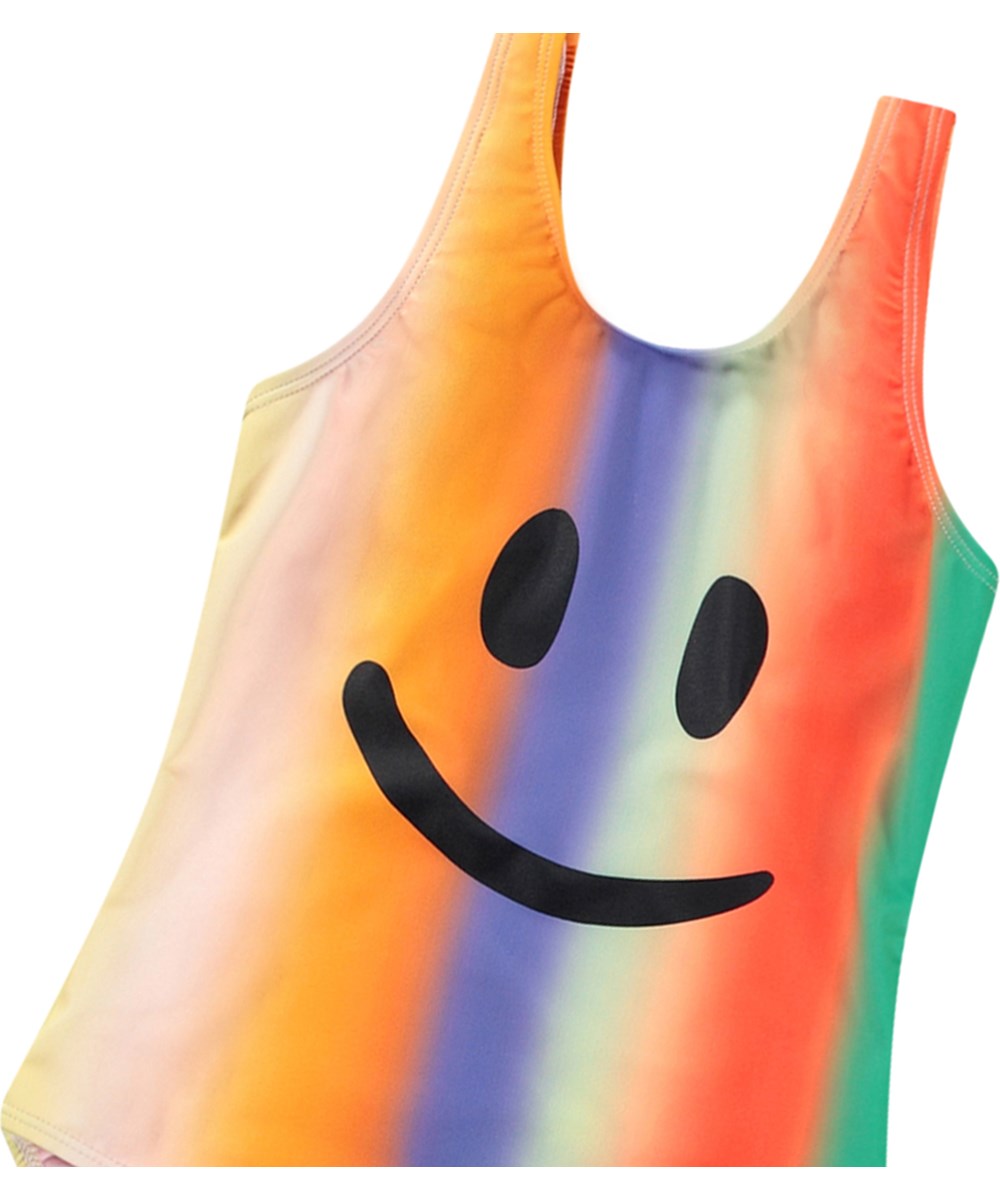 Nika - Smile In Colours - Bunt bedruckter Badeanzug für aktive Kinder aus recyceltem Polyester mit UV-Schutz 50+.