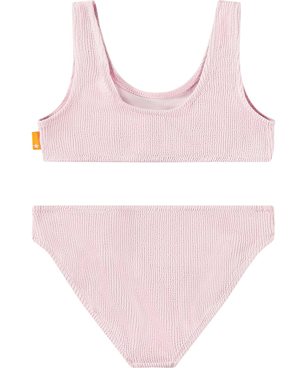 Nola Solid - Pink Glace - Dehnbarer rosa Bikini für Kinder in einem strukturierten Muster mit UV-Schutz 50+.
