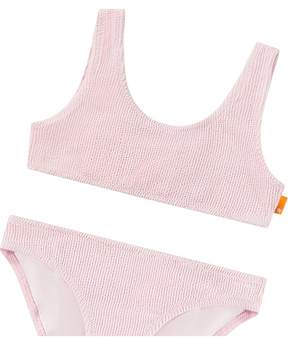 Nola Solid - Pink Glace - Dehnbarer rosa Bikini für Kinder in einem strukturierten Muster mit UV-Schutz 50+.