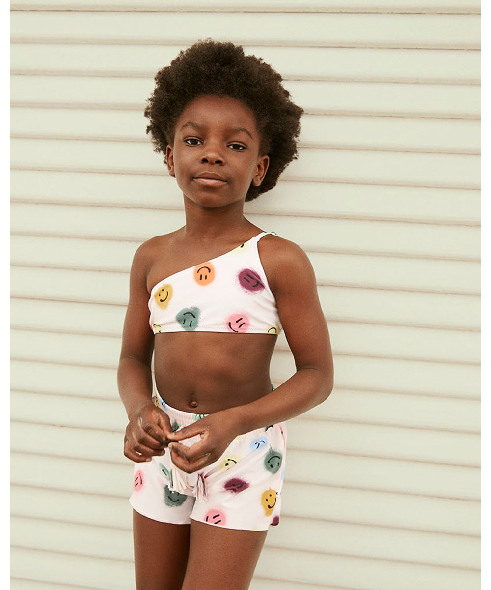 Naja - Happy Dots - Asymetrisk recycled rosa bikini med ansigter