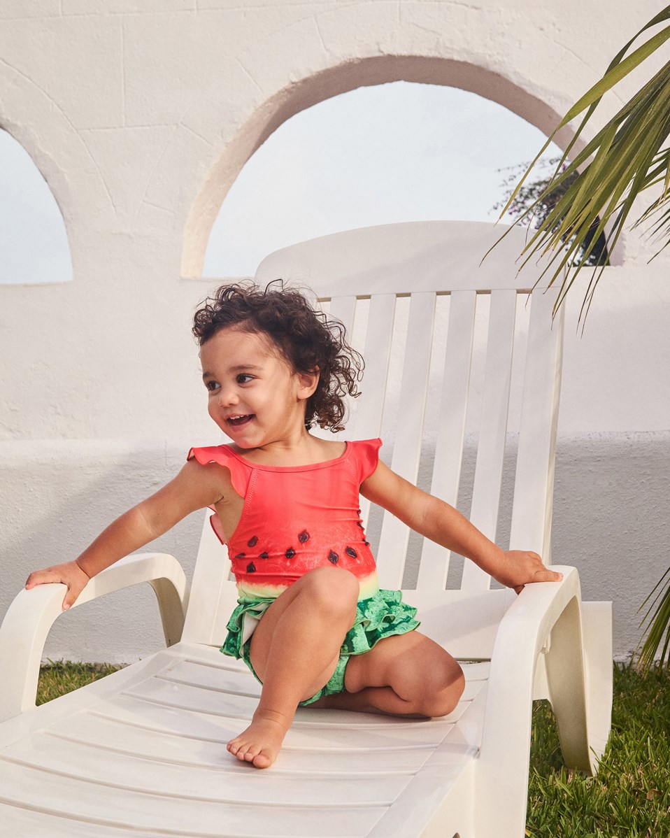 Nalani - Melon - Baby badedragt i genanvendt polyester med UV-beskyttelse 50+.