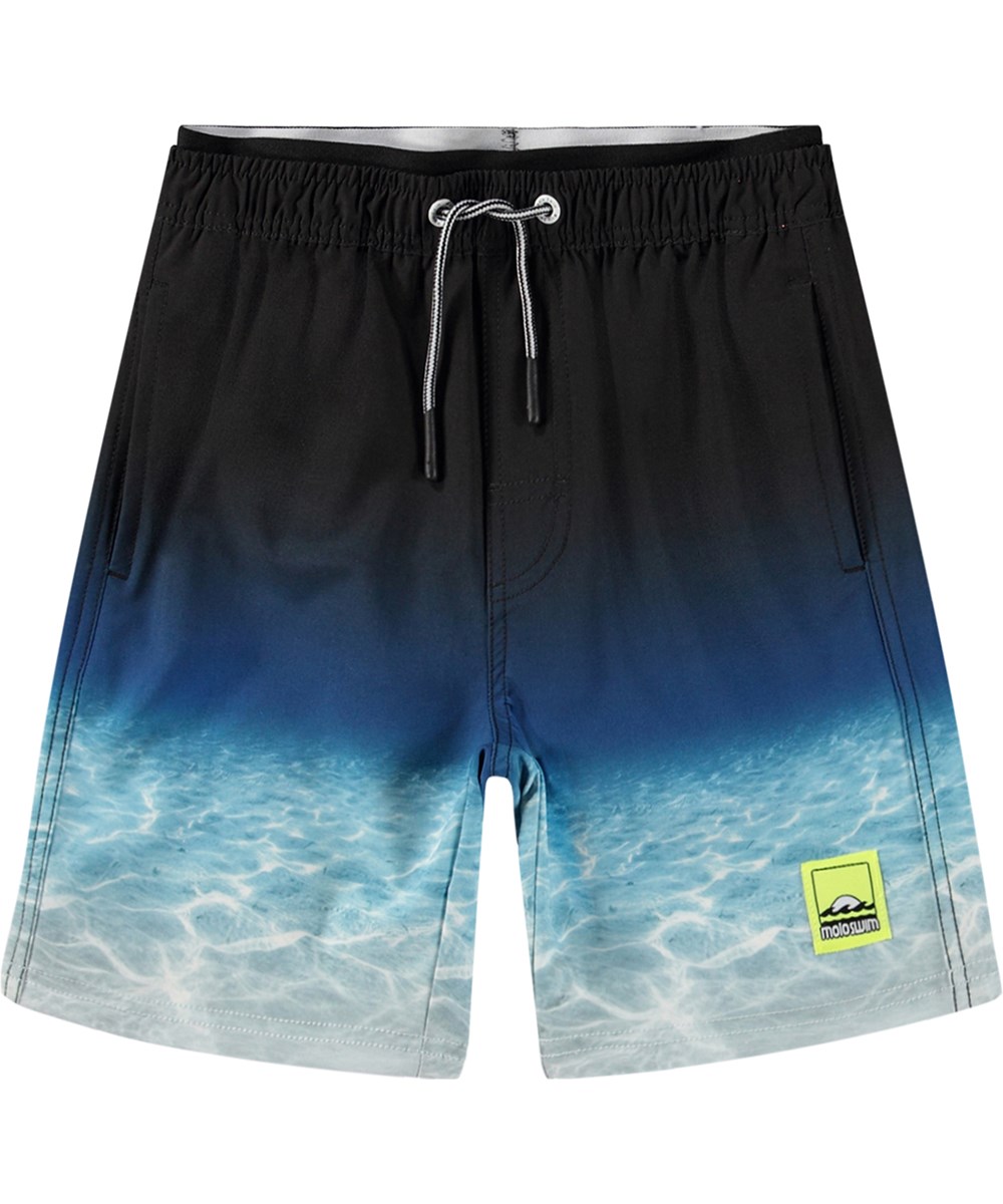 Neal - Faded Ocean - Knælange sorte badeshorts til aktive børn i genanvendt polyester med UV-beskyttelse 50+.
