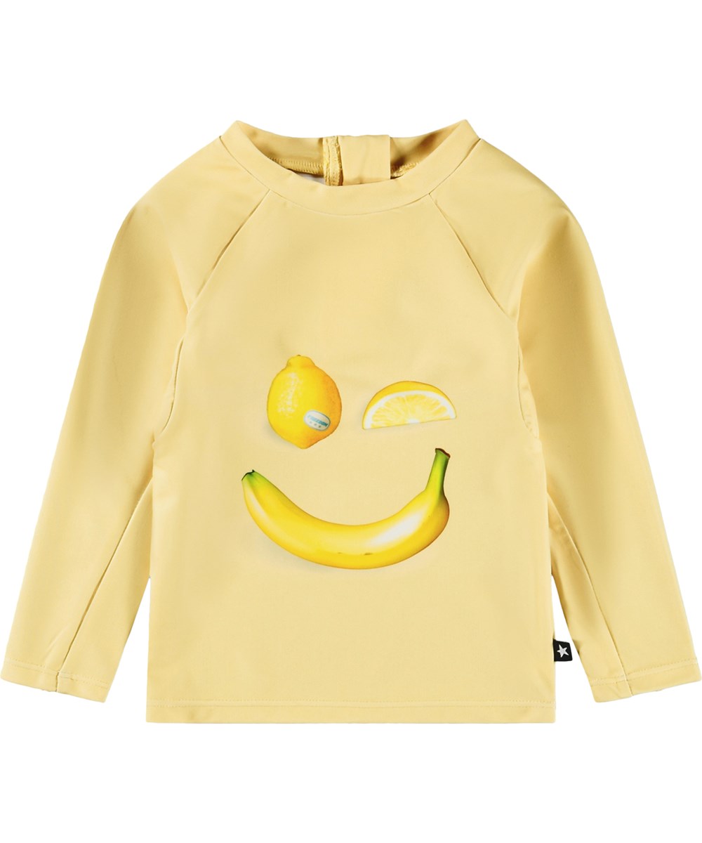 Nemo - Happy Fruits - Gul baby badebluse med frugtprint i genanvendt polyester med UV-beskyttelse 50+.