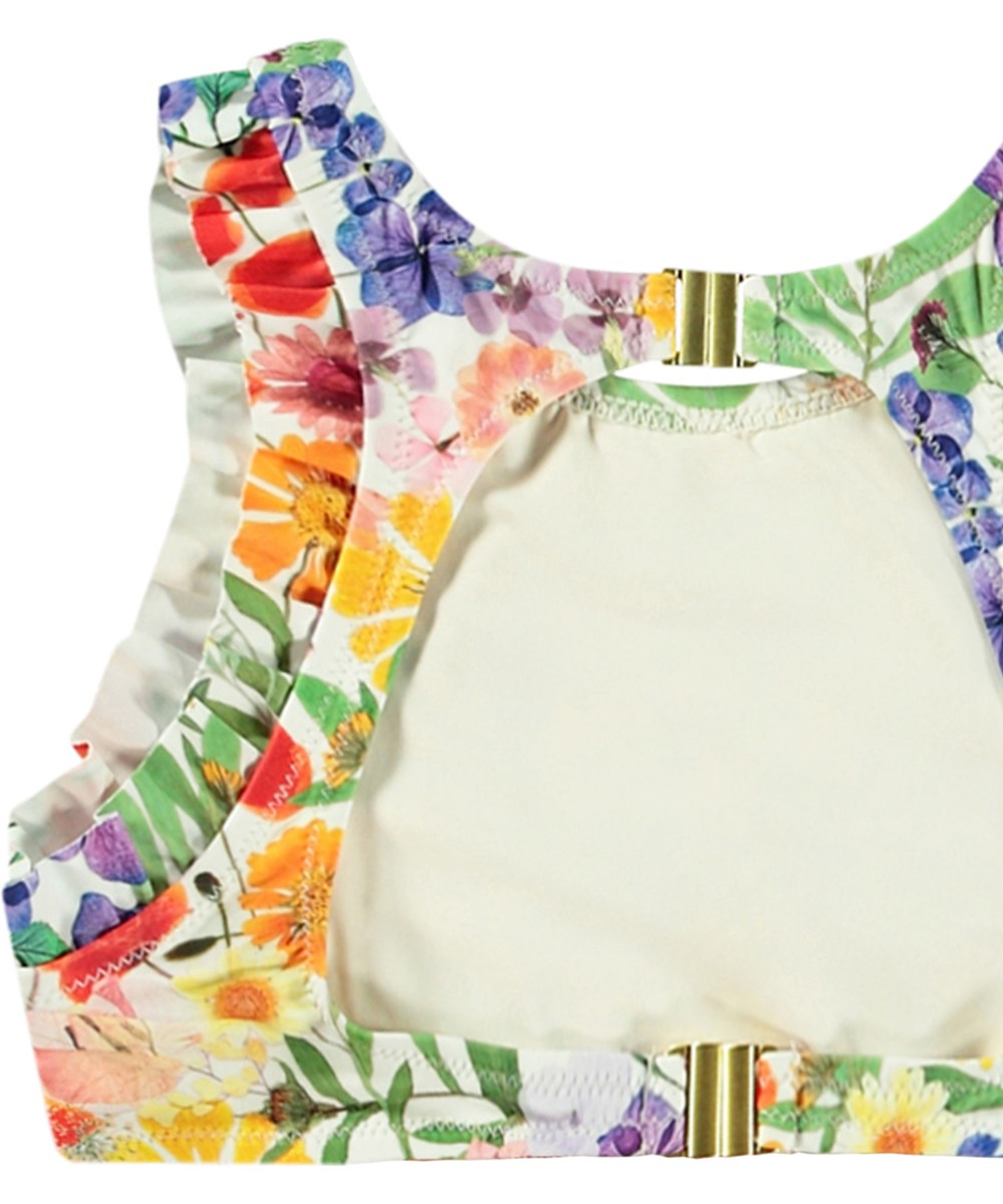 Nia - Flowerpress - Strækbar bikini til aktive børn fremstillet i genanvendt polyester med UV-beskyttelse 50+