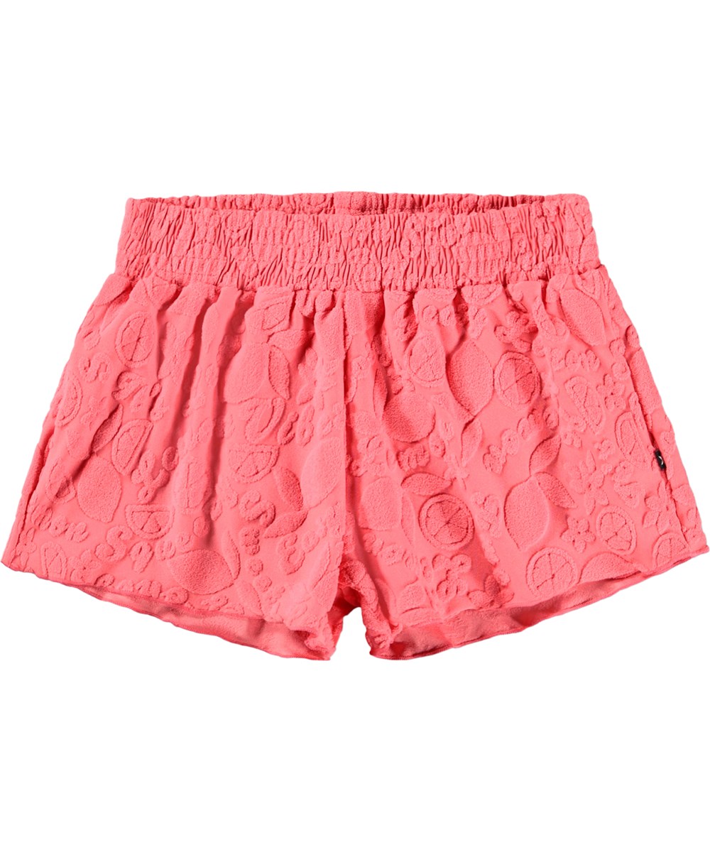 Nicci Terry - Lemon Quotes - Pink badeshorts med citrusmønster og UV-beskyttelse 50+.