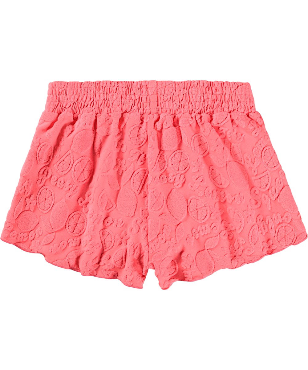 Nicci Terry - Lemon Quotes - Pink badeshorts med citrusmønster og UV-beskyttelse 50+.