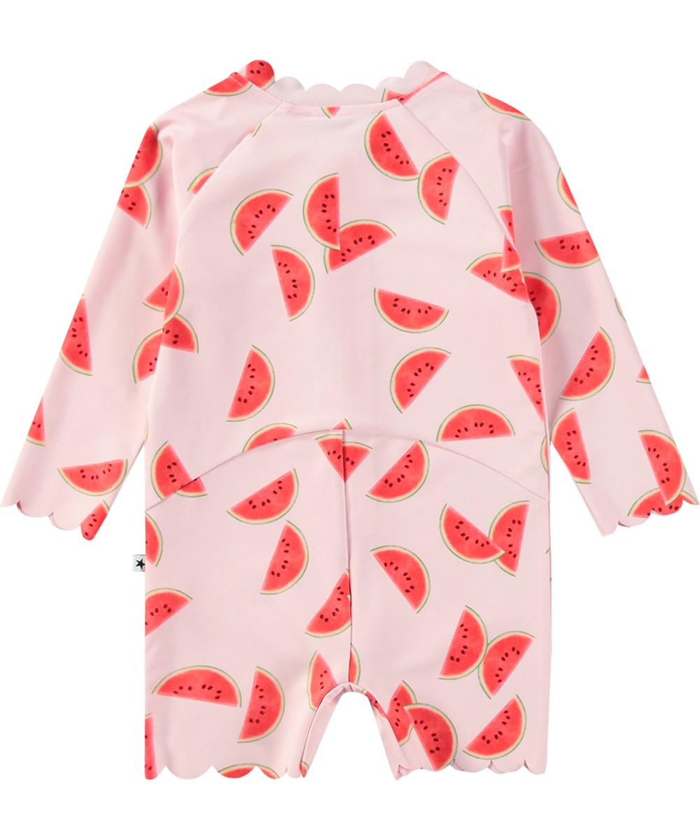 Nigella - Melon Pink - Lyserød badedragt til børn med korte ærmer og ben i genanvendt polyester og UV-beskyttelse 50+.