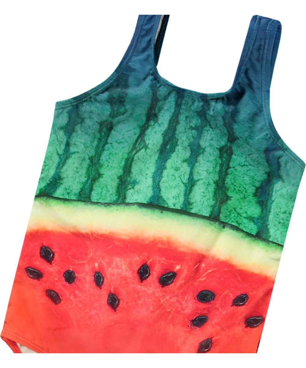 Nika - Melon - Badedragt med print til aktive børn i genanvendt polyester med UV-beskyttelse 50+.
