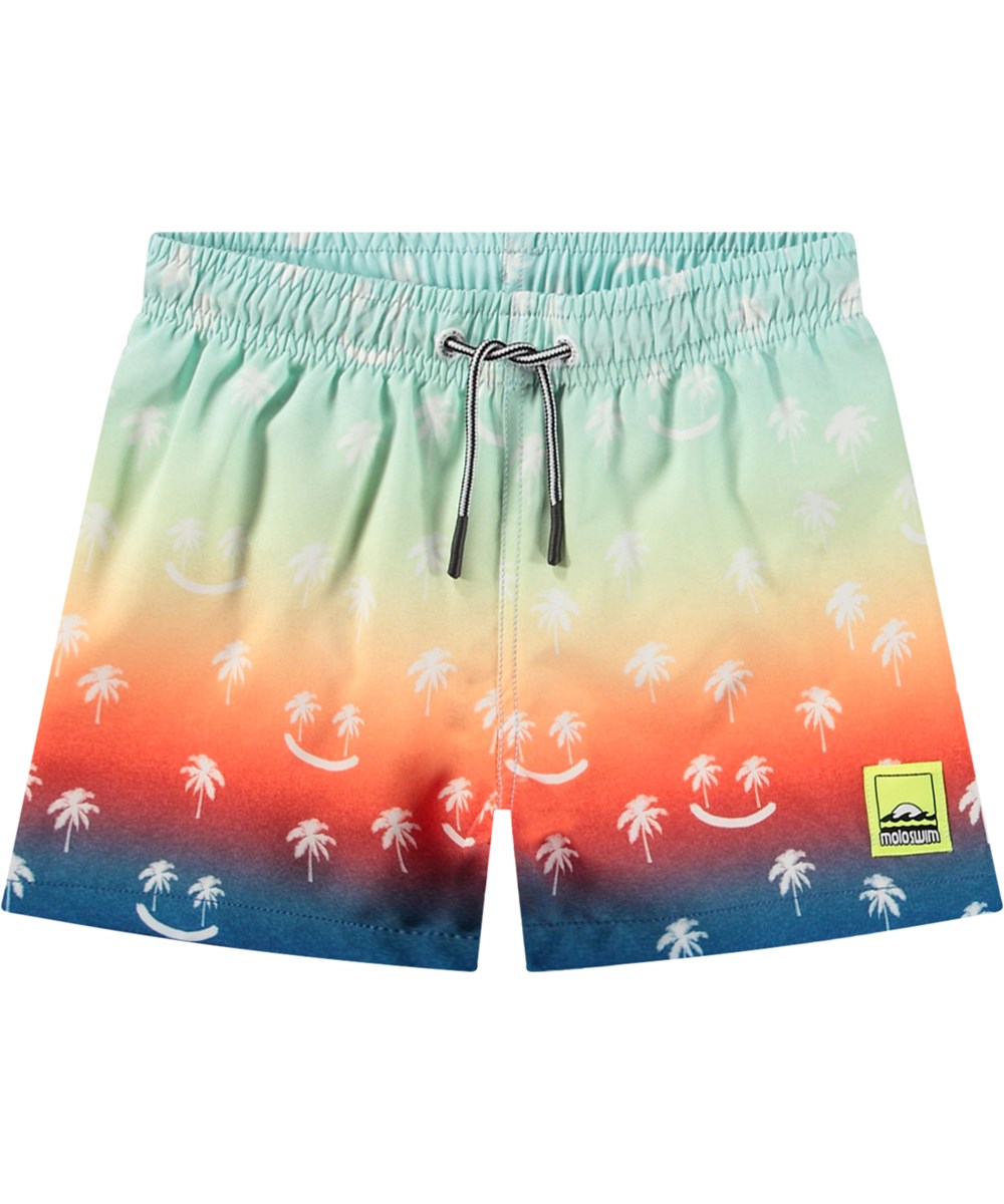 Niko - Palmtree Smile - Regnbuefarvet sporty badeshorts til aktive børn i genanvendt polyester med UV-beskyttelse 50+.