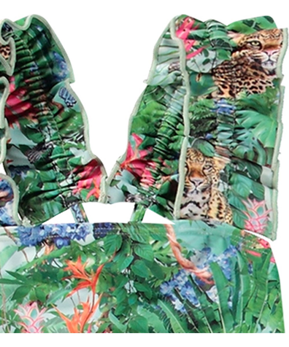 Nitika - Green Tropical - Grøn badedragt til aktive børn i genanvendt polyester med UV-beskyttelse 50+.