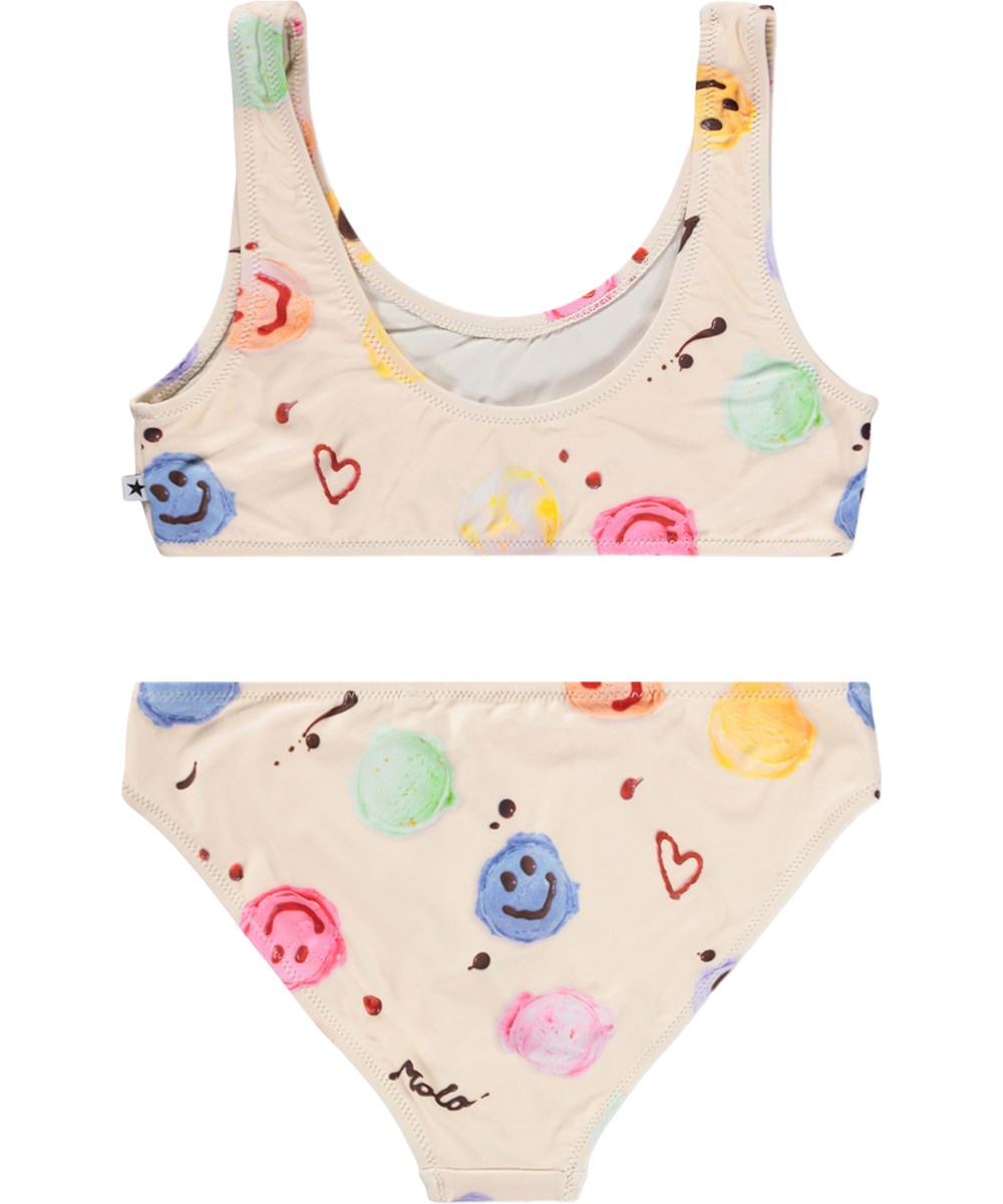 Nola - Smile Scoops - Cremefarvet strækbar bikini med isprint til børn med i genanvendt polyester og UV-beskyttelse 50+.