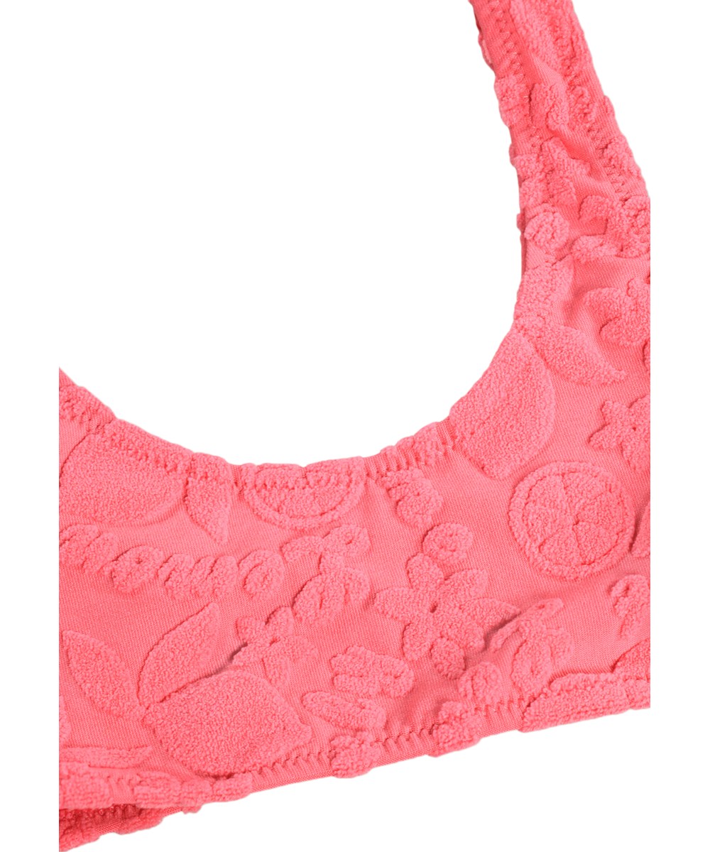 Nola Terry - Lemon Quotes - Pink, strækbar bikini til børn med citrusmønster i genanvendt polyester og UV-beskyttelse 50+.