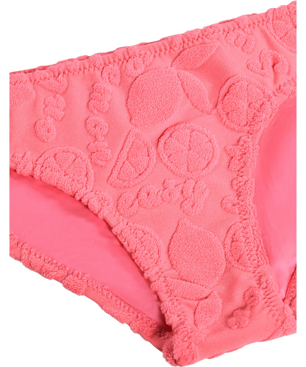 Nola Terry - Lemon Quotes - Pink, strækbar bikini til børn med citrusmønster i genanvendt polyester og UV-beskyttelse 50+.