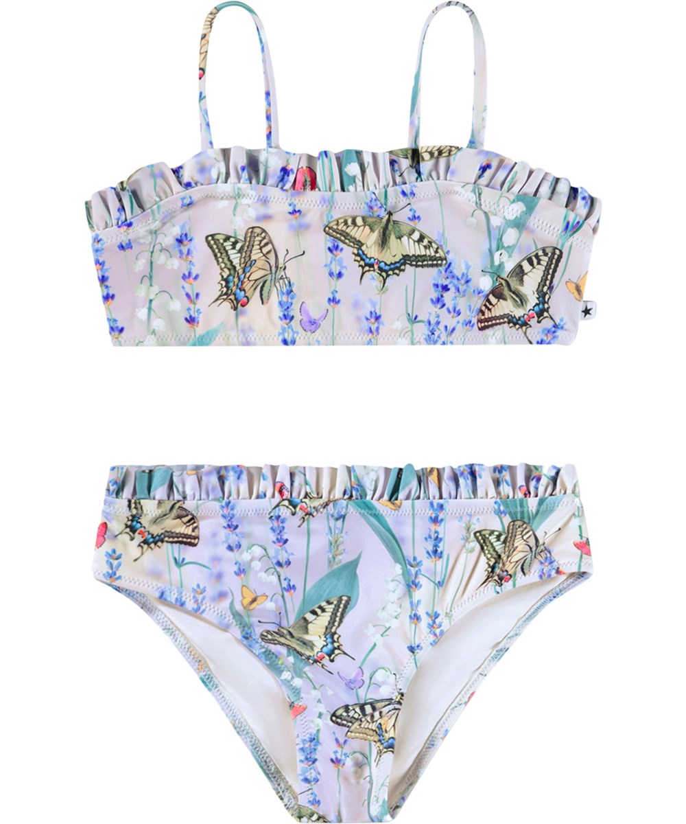 Naila - Lavender Field - Stretchig, lila fjärilsprintad bikini för barn i återvunnen polyester med UV-skydd 50+.
