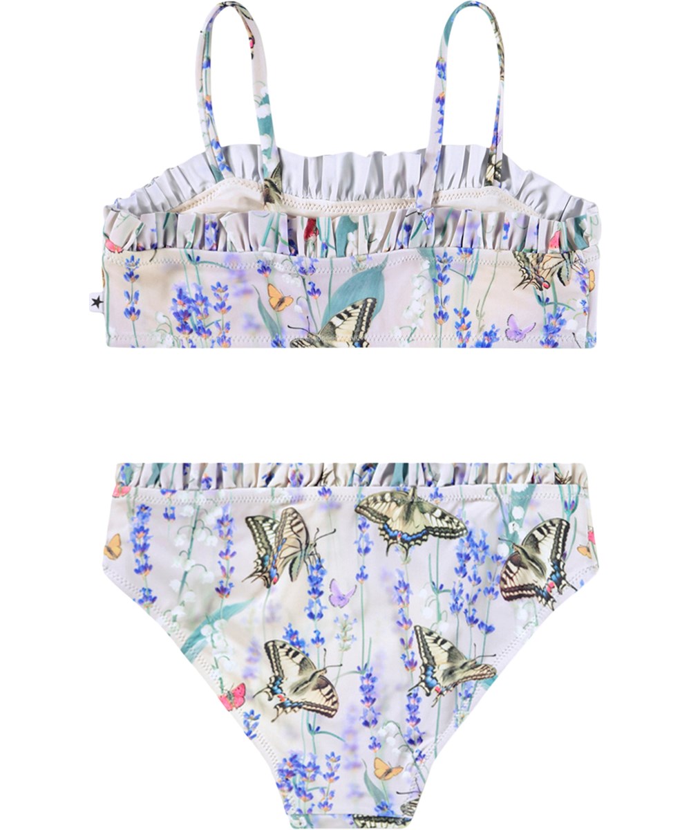 Naila - Lavender Field - Stretchig, lila fjärilsprintad bikini för barn i återvunnen polyester med UV-skydd 50+.