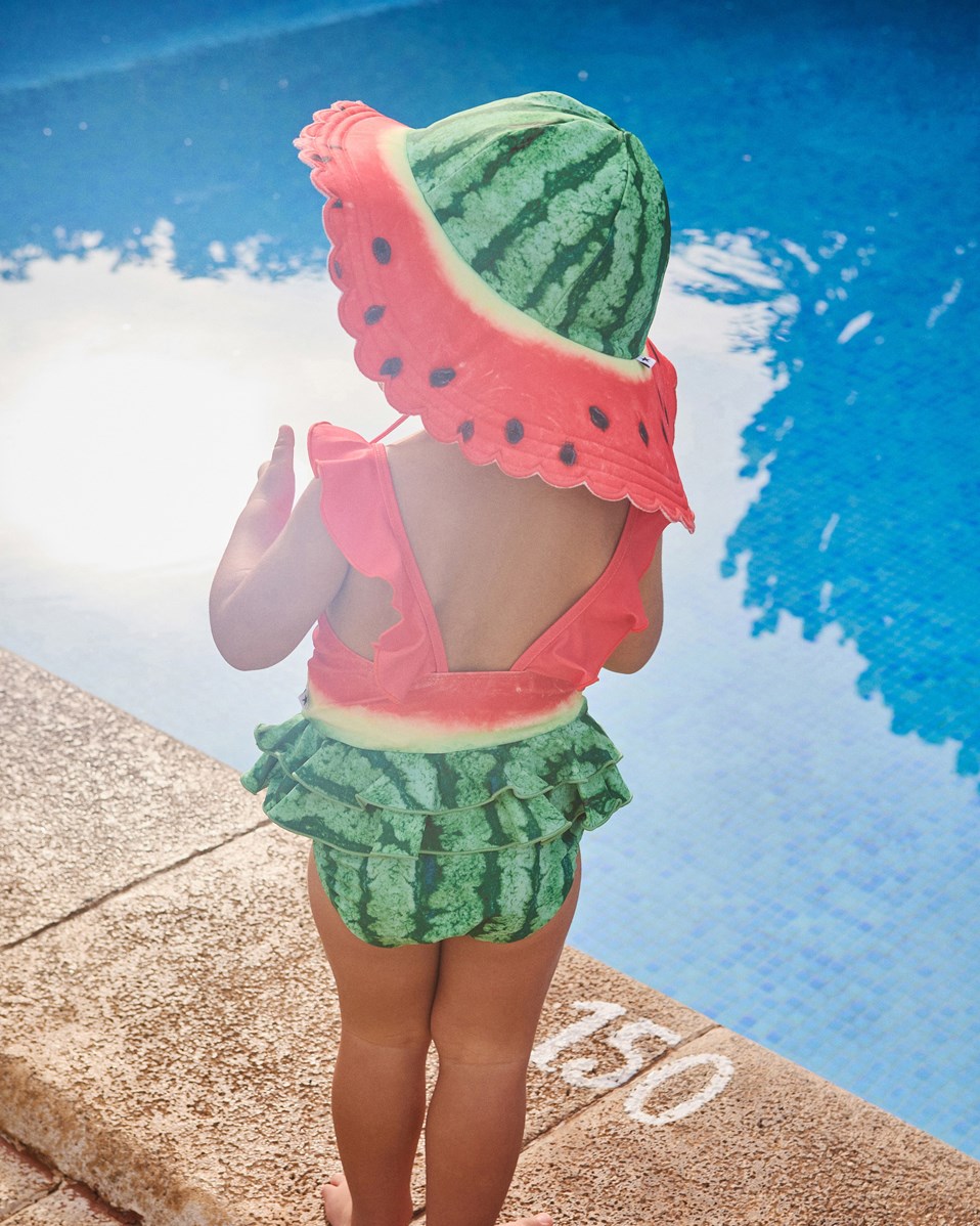 Nalani - Melon - Babysimdräkt i återvunnen polyester med UV-skydd 50+.