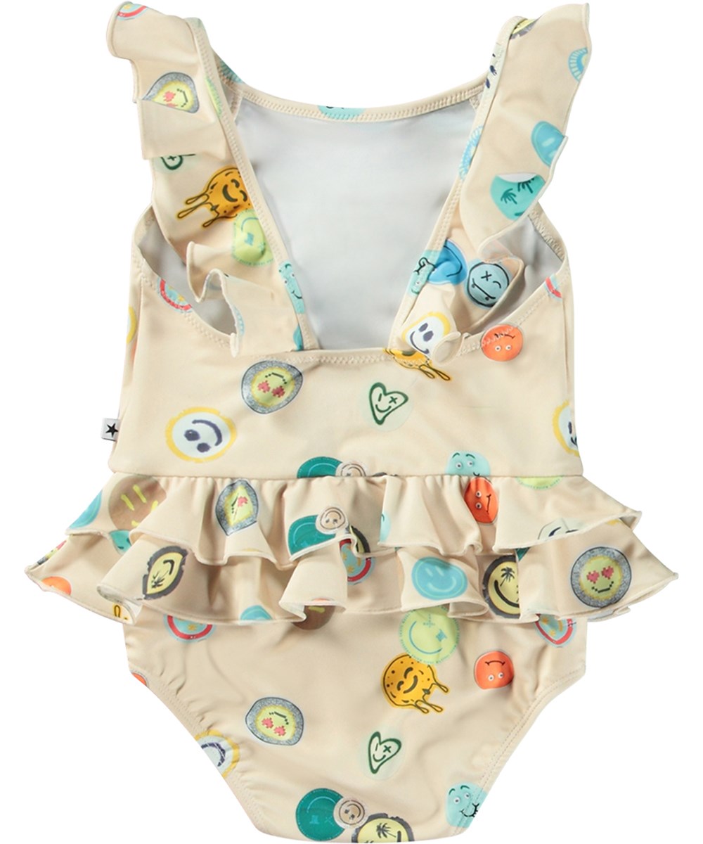 Nalani - Sand Smile - Babysimdräkt i återvunnen polyester med UV-skydd 50+.