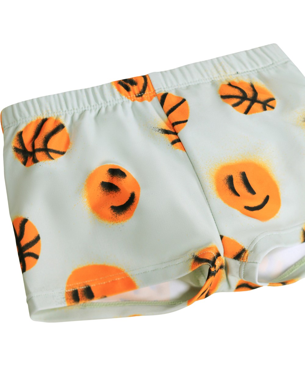 Nansen - Mini Basket - Gråa babysimshorts med basketmönster i återvunnen polyester med UV-skydd 50+.
