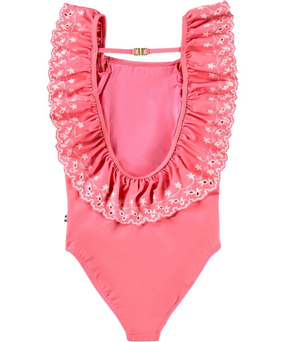 Nathalie - Raspberry Ice - Rosa baddräkt med volanger och broderidetaljer för barn i återvunnen polyester med UV-skydd 50+.