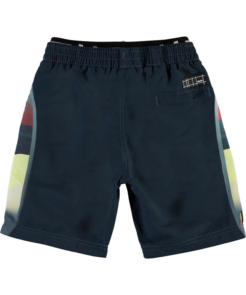 Neal - California Surf - Långa UV-shorts med palmer och solnedgång