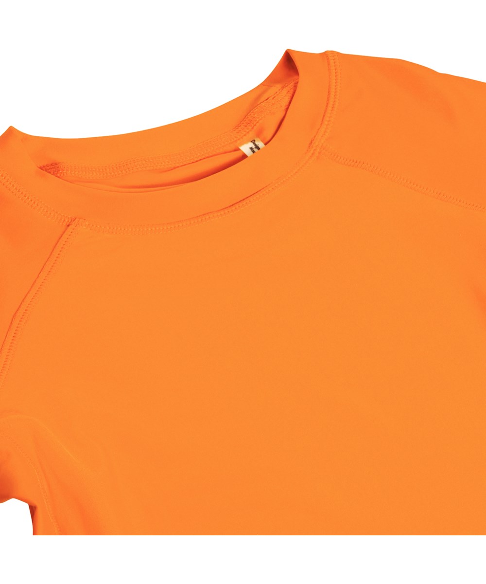 Neptune - Sun Orange - Orange simtröja för barn i återvunnen polyester med UV-skydd 50+.