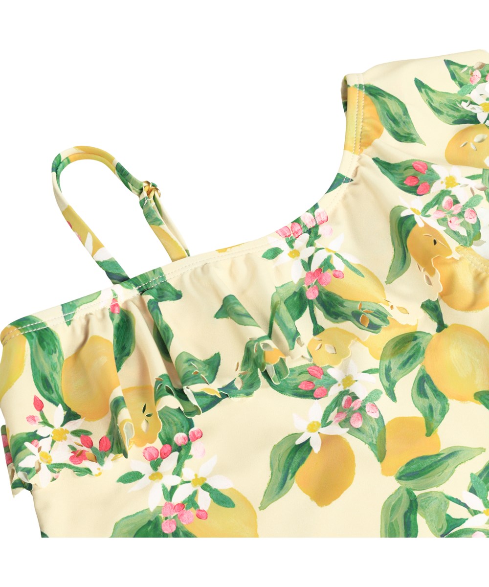 Net - Citrus - Gul baddräkt med citrusmönster för barn i återvunnen polyester med UV-skydd 50+.