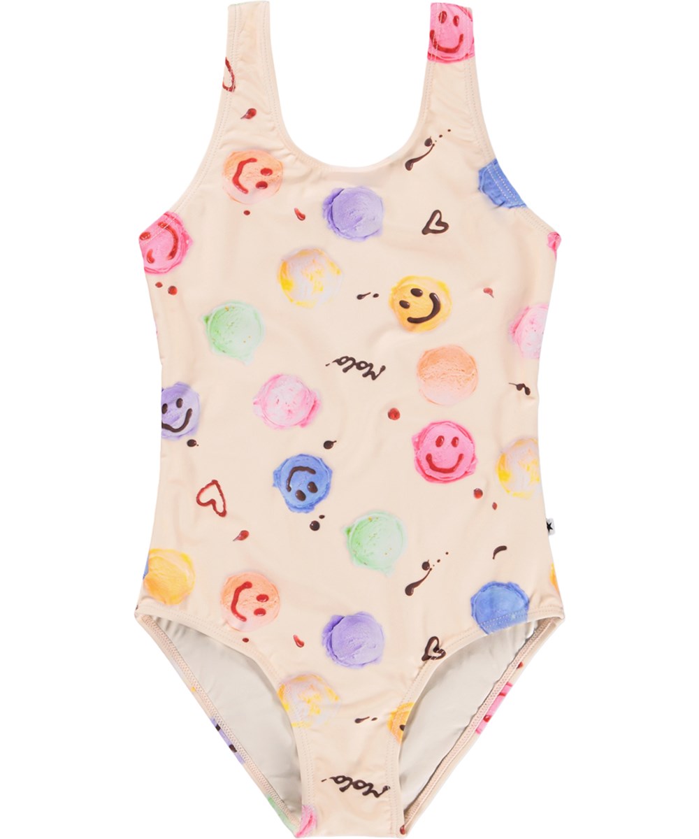 Nika - Smile Scoops - Gräddfärgad baddräkt med glassmönster för barn i återvunnen polyester med UV-skydd 50+.