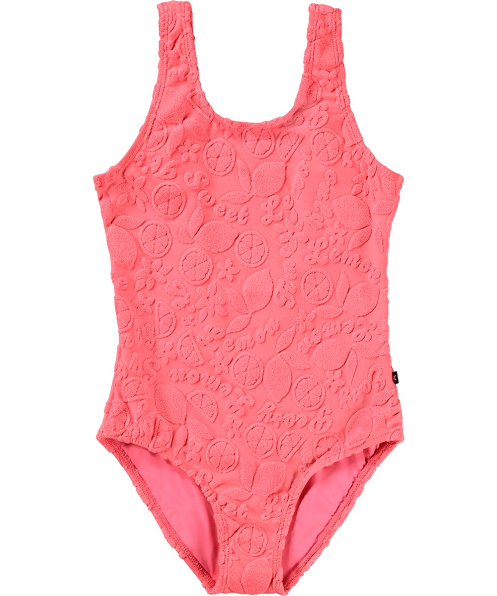 Nika Terry - Lemon Quotes - Rosa baddräkt med citrusmönster för barn i återvunnen polyester med UV-skydd 50+.