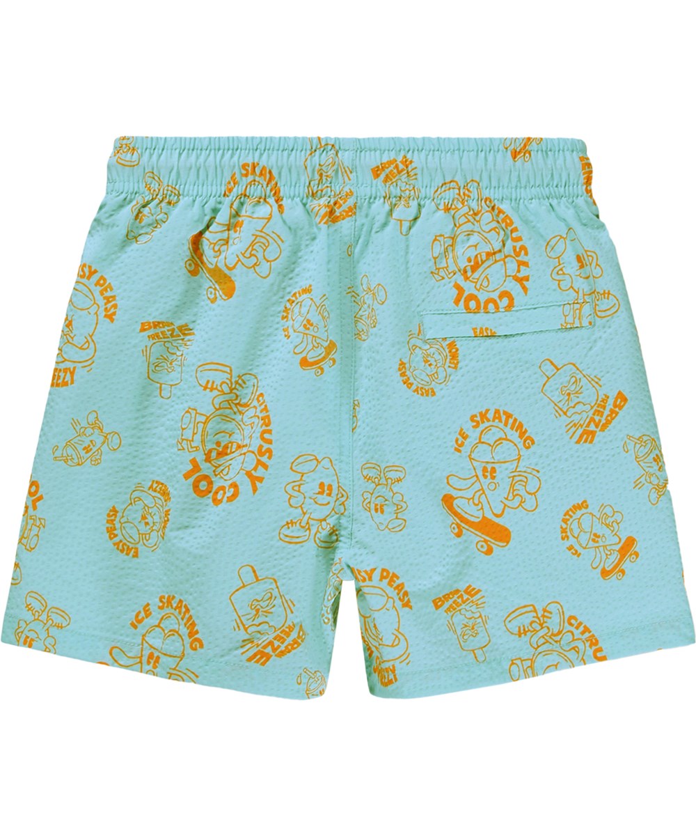 Niko - Brain Freeze - Sportiga, blå badbyxor med orange och tecknat mönster för aktiva barn i återvunnen polyester med UV-skydd 50+.